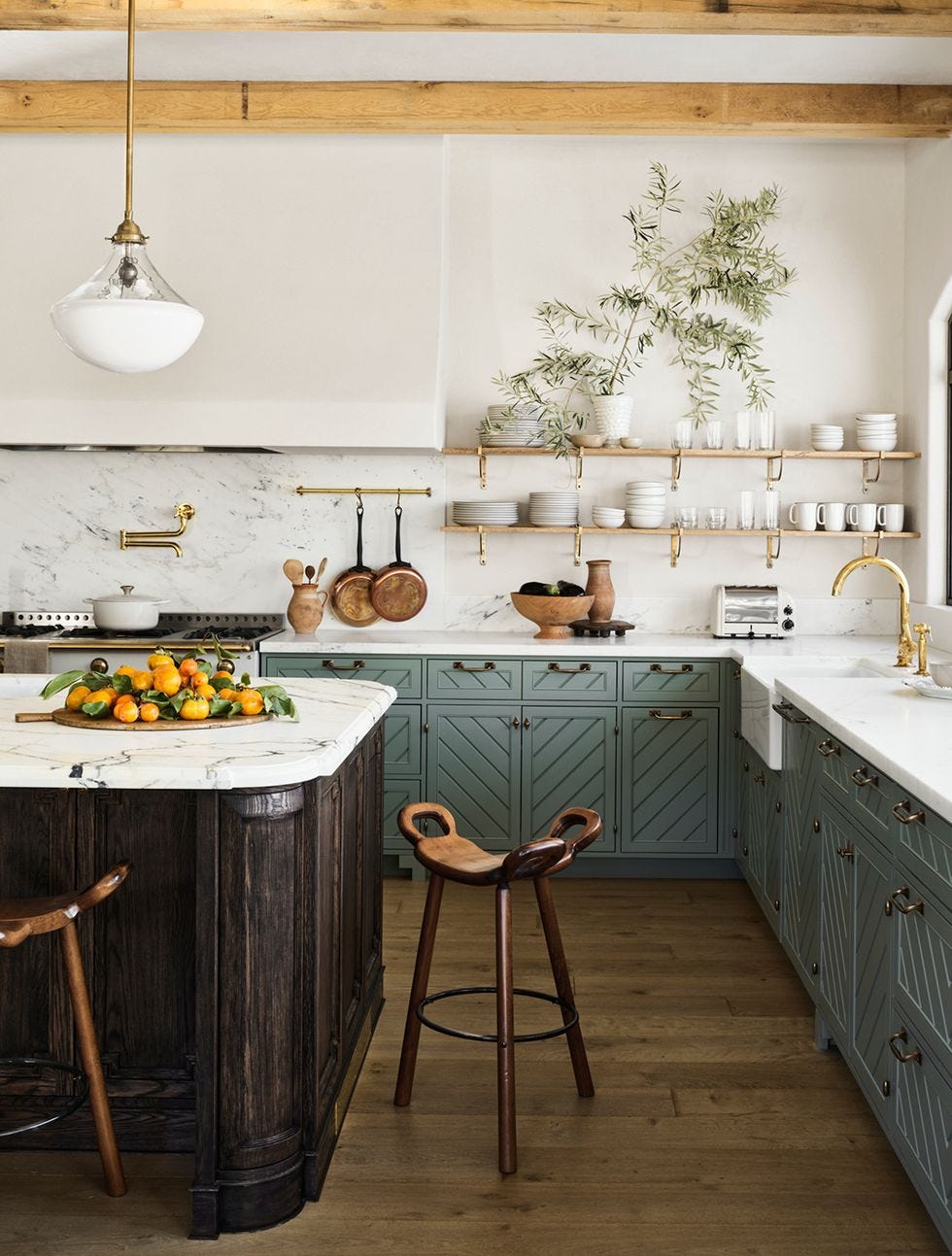 A kitchen with a table and chairs A kitchen with a table and chairs