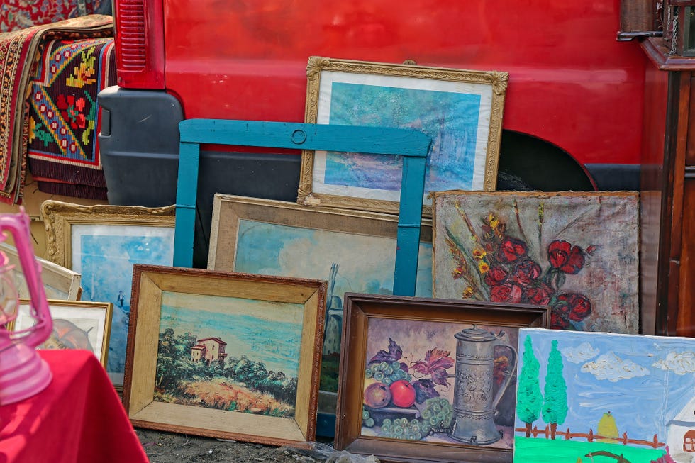 Pancevo, Serbia April 19, 2015: Old paintings Vintage Art Picture Frames Second Hand Sale at flea market.