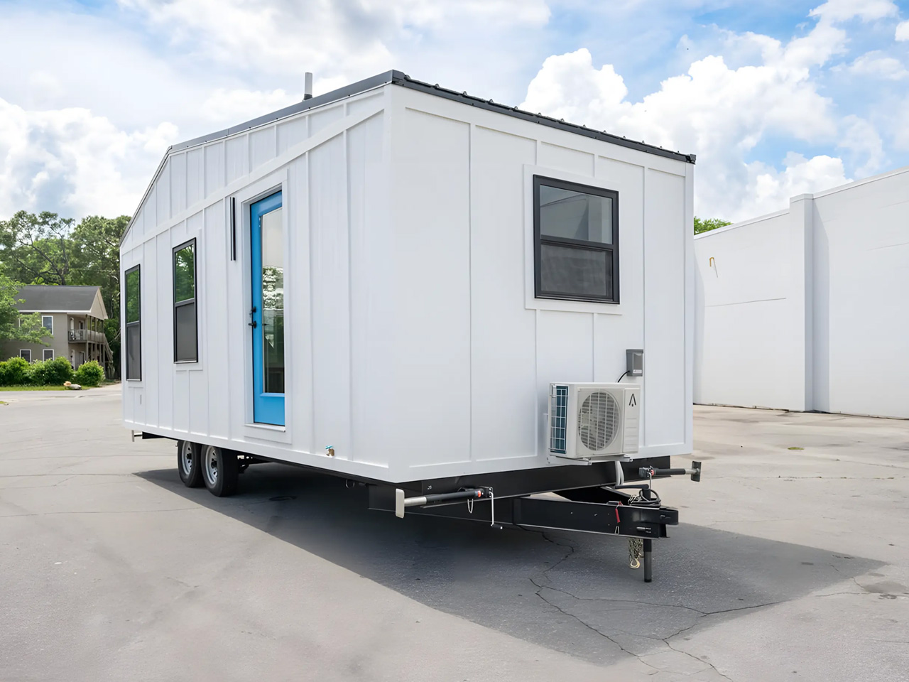An affordable one -story tiny house offers a spacious interior, modern amenities and nationwide delivery