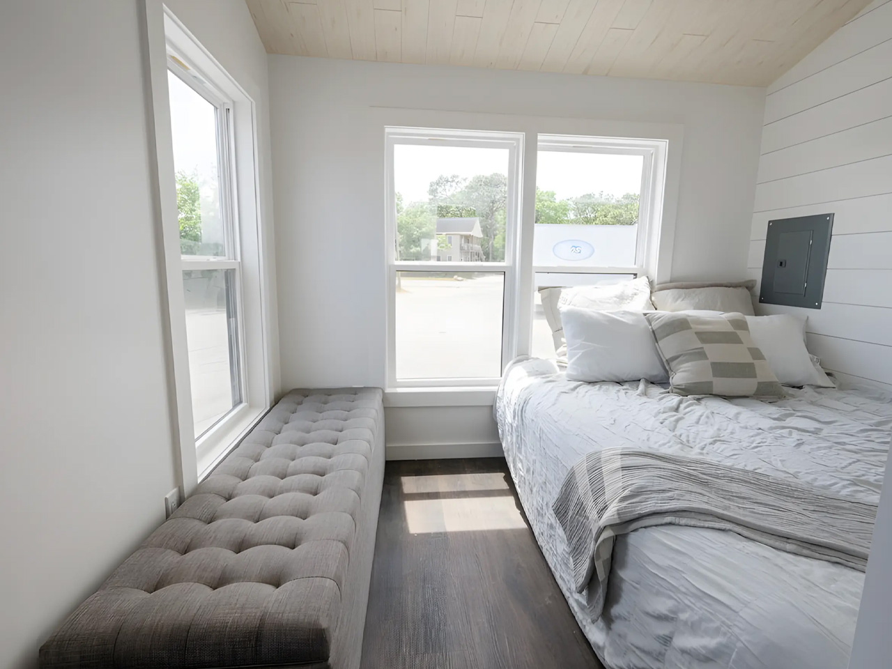 An affordable one -story tiny house offers a spacious interior, modern amenities and nationwide delivery
