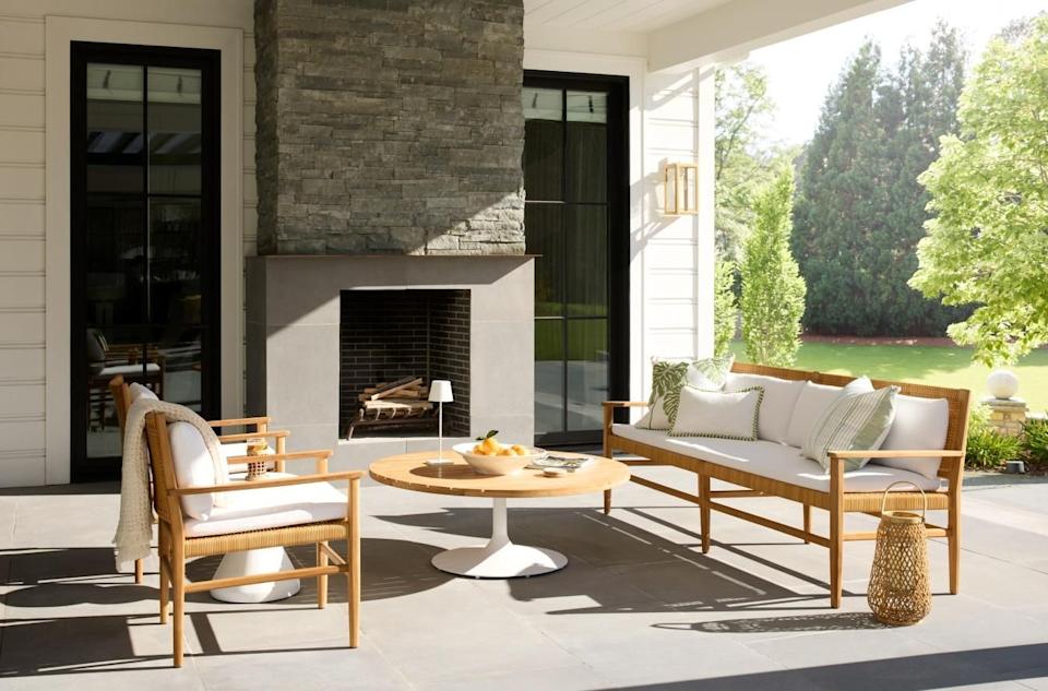 Outdoor seating area with fireplace and decorative elements