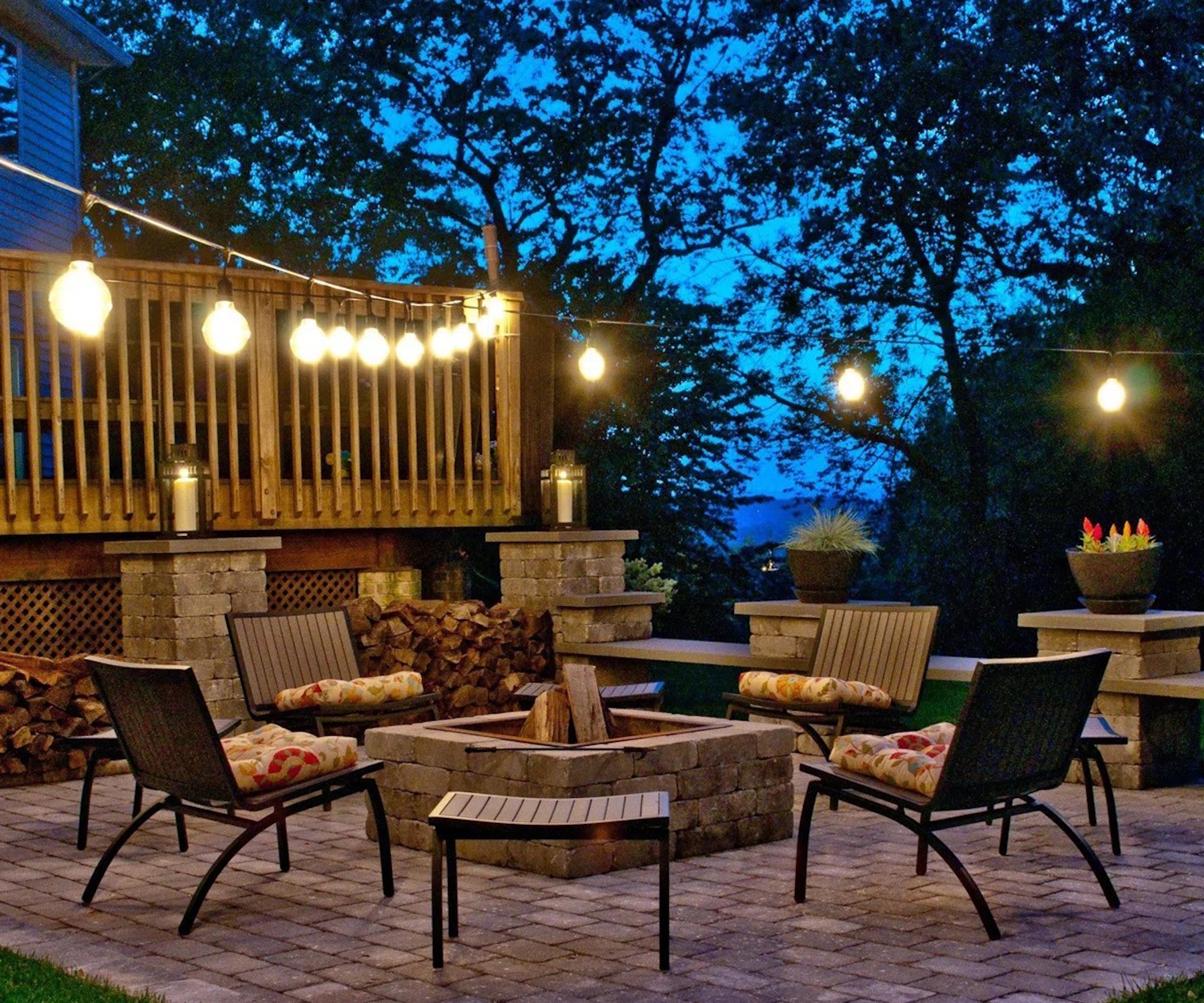 Festival lights hang over a terrace in summer