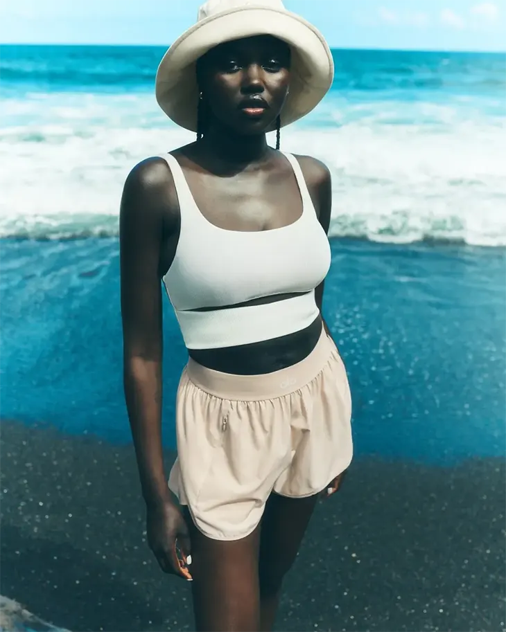 Adut Akech leads the summer 2025 campaign from Alo Yoga