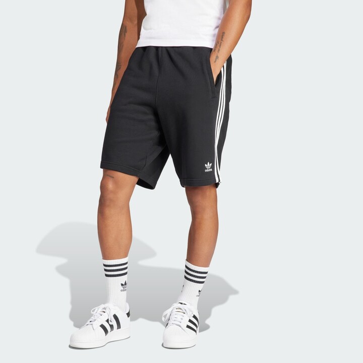 Black adidas adicolor 3 -stripes cotton shorts.