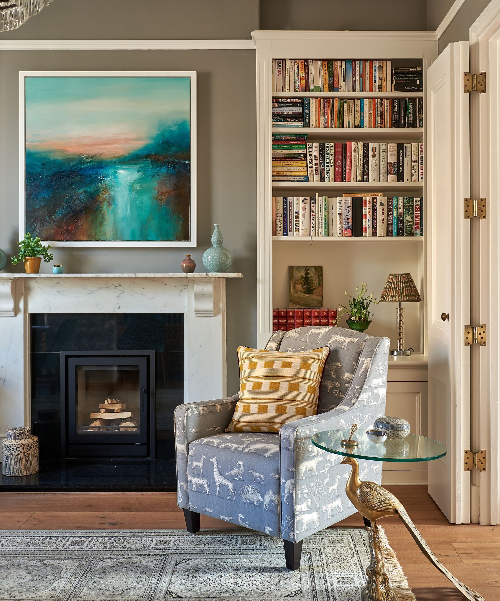A living room that was painted in various tones of Portland Stone Winne Little Greene