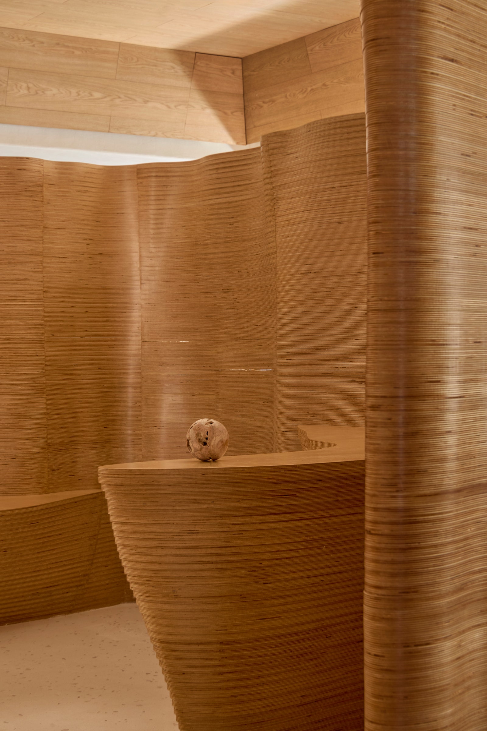The image can contain the interior in the interior designer made of wood and wooden panels