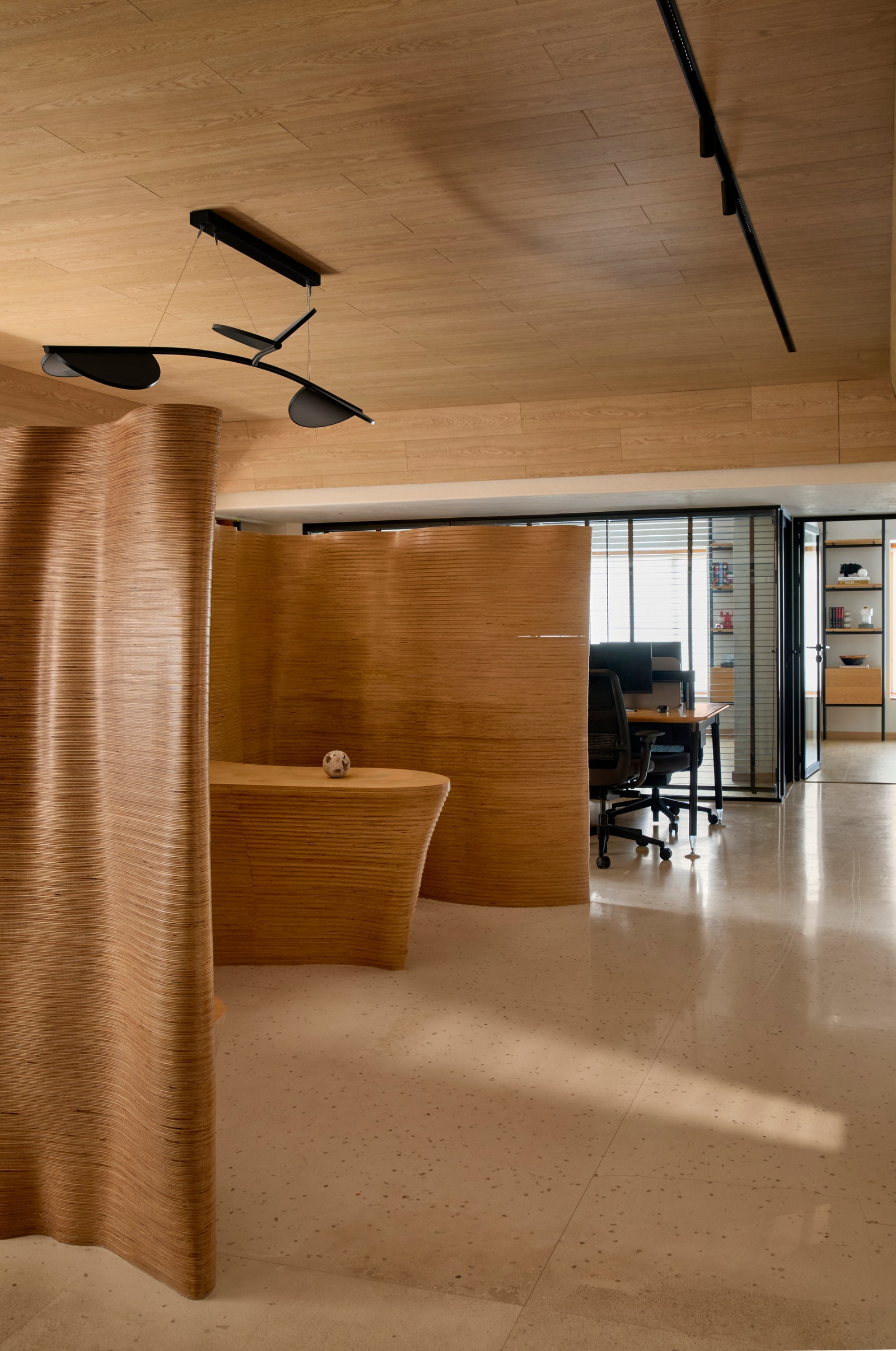 Image can contain interior design in the interior designer floor floor wood chair furniture appliance ceiling fan and device
