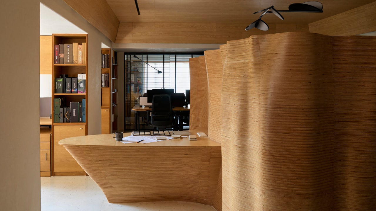 This office in Mumbai is a celebration for natural materials and the withdrawn design