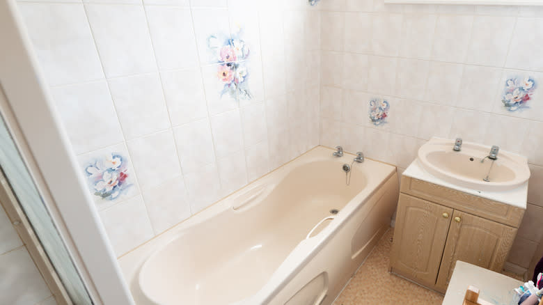 dated beige bathroom