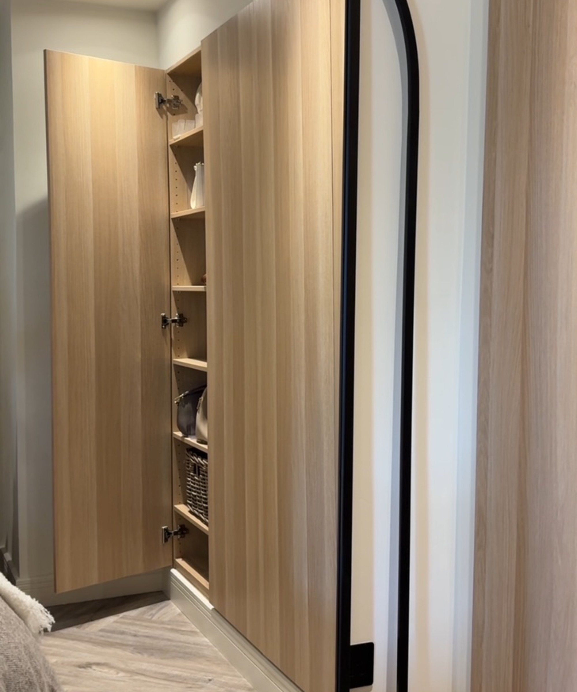 Ikea Pax turned into built -in wardrobes in a bedroom