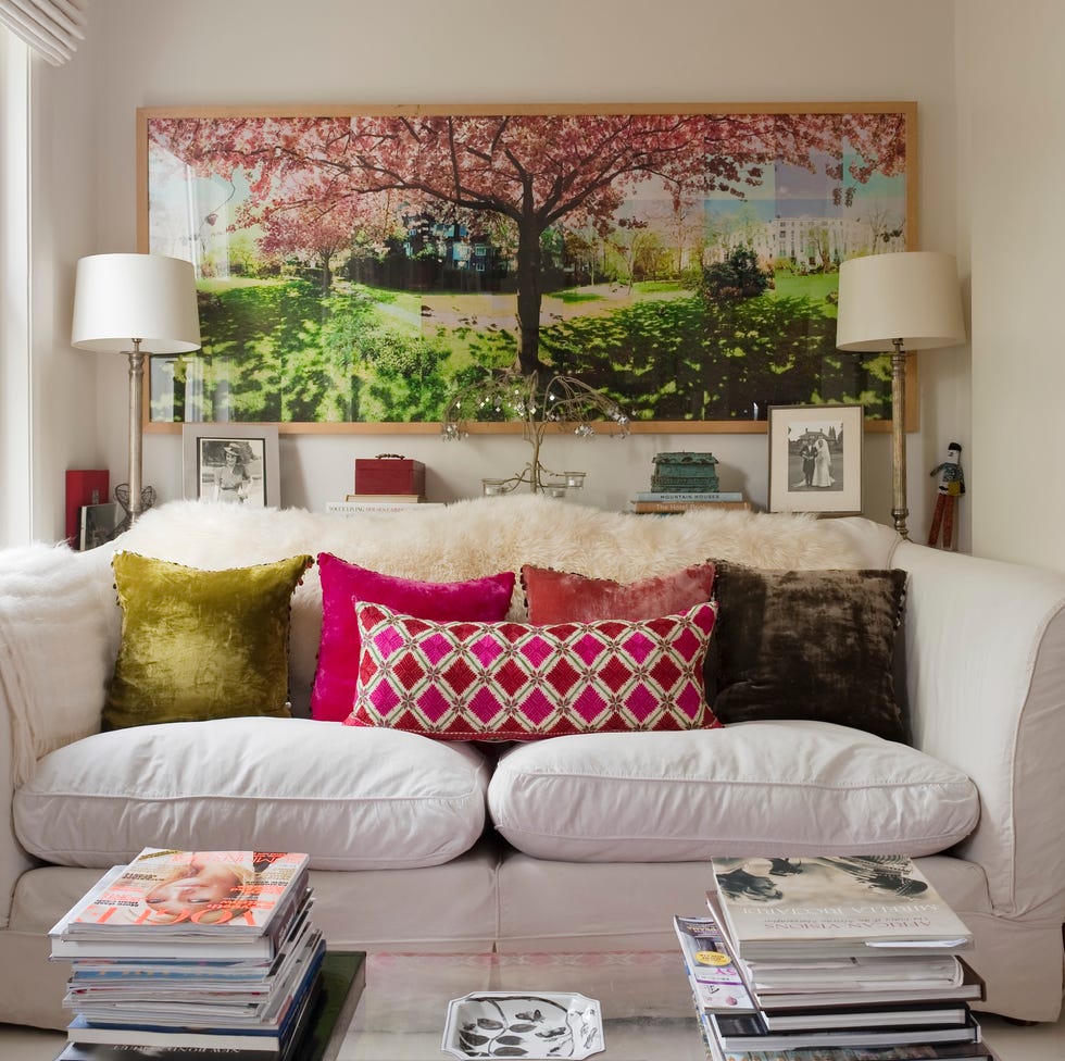 White Beth sofa from the sofa workshop with different colors and fabric pillows from Anglo Oriental Antiques