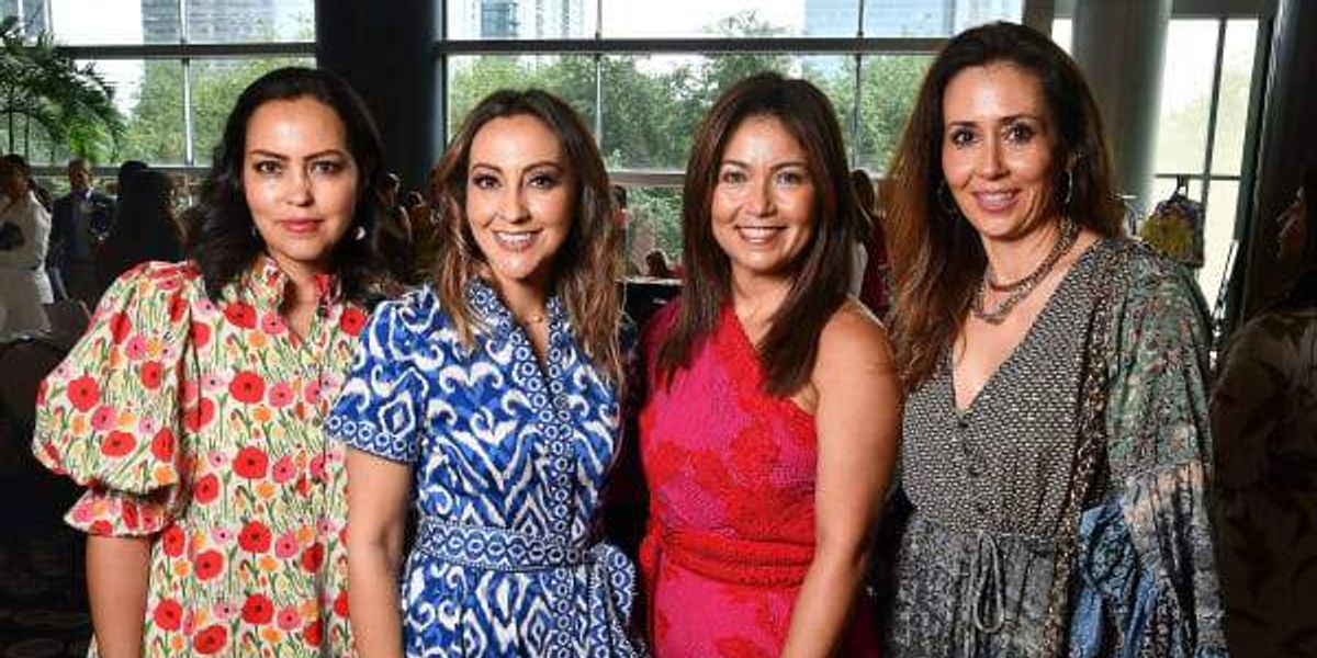 Fashion show and tequila -toast light Latin women's initiative for lunch