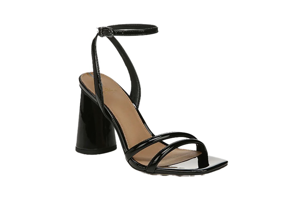 A black shoe with a high heeled