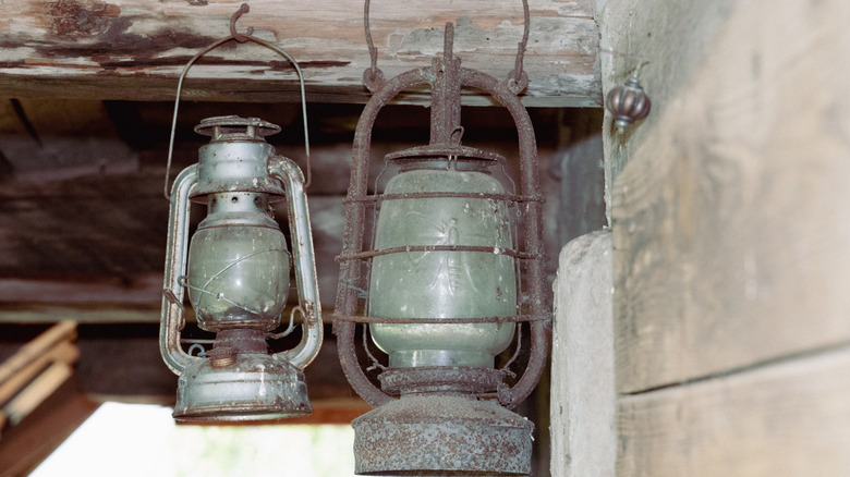 Ancient kerosene lanterns with natural patina