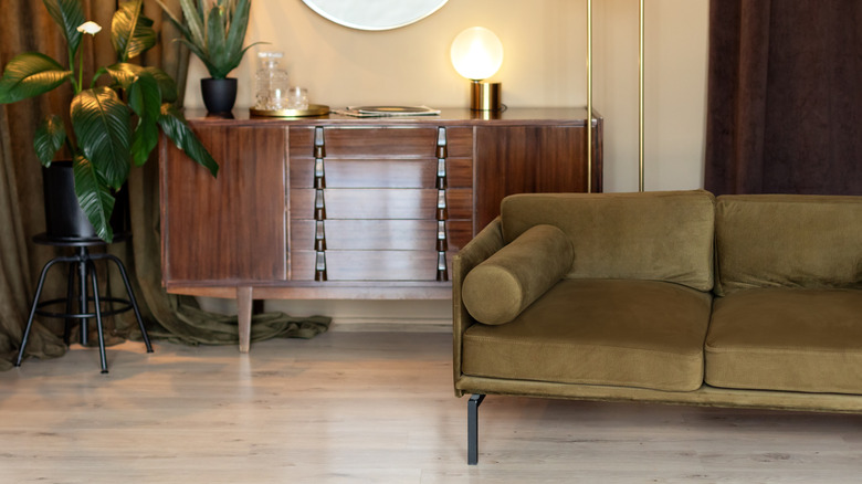 A velvet sofa in the modern living room
