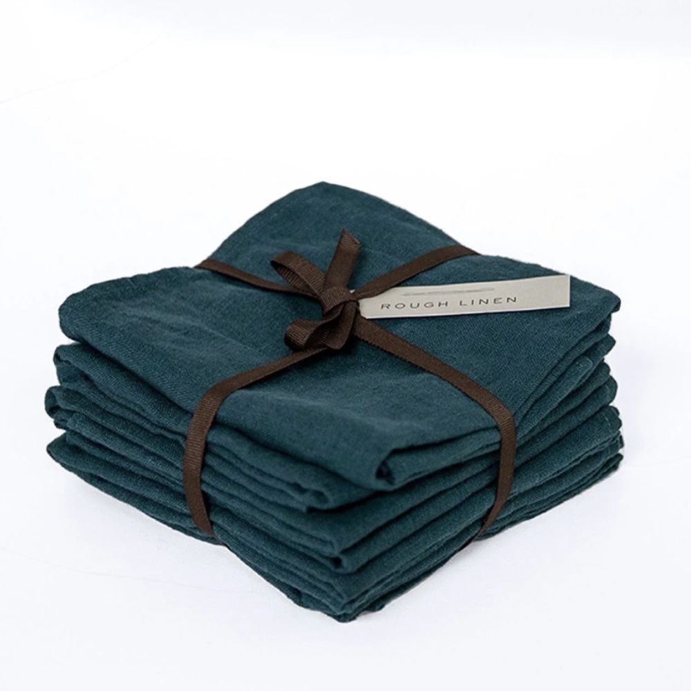 Stack of Marineblauer Leinen -Teatowels folded and bound with one ribbon 