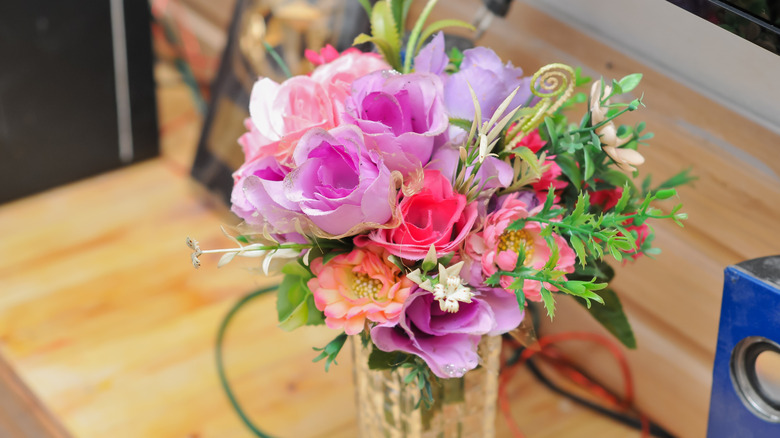 Bouquet of flowers fake flowers at the table
