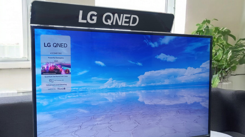A LG QLED TV that looks in an apartment.