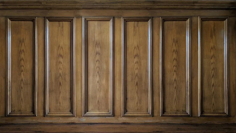 Old classic wall with vintage brown beech wood panels
