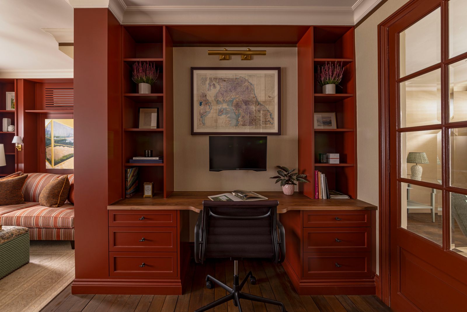 Image can contain interior designers in the interior designer chair Furniture Plant Book Publication Lamp Couch Art and Painting