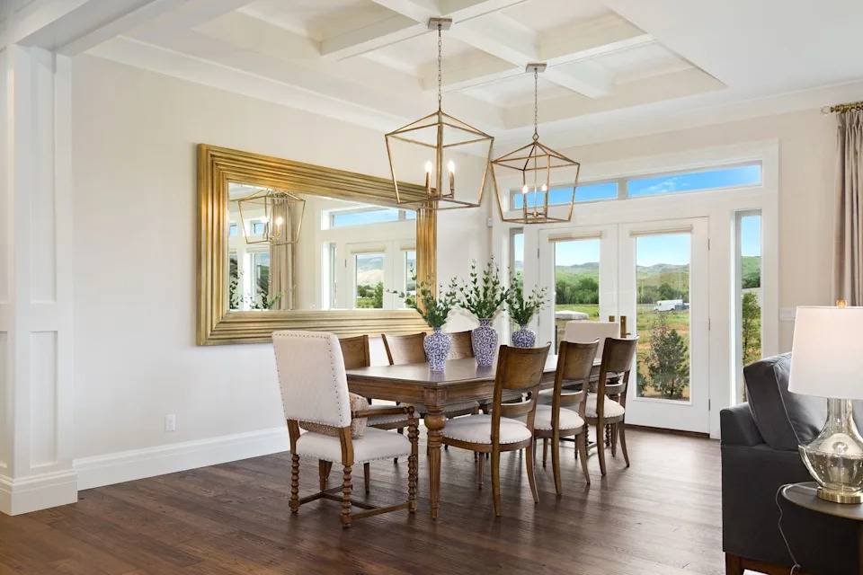 High cassette ceiling in the formal dining room with a large house