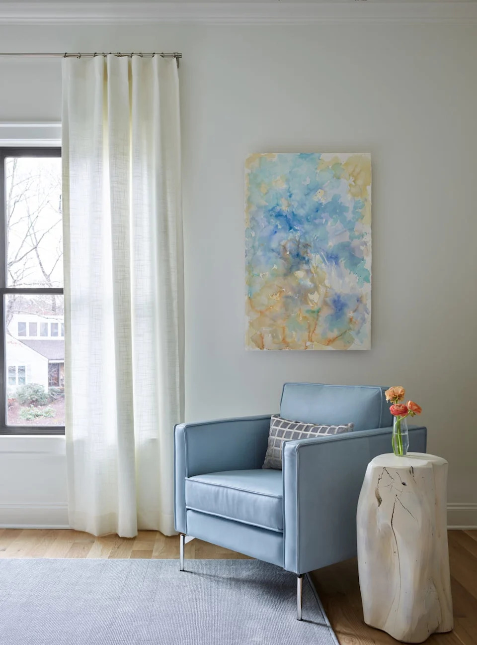 Room with a blue side chair