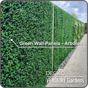 Artificial Arborea Green Wall Paneele, which are installed on a house in the garden