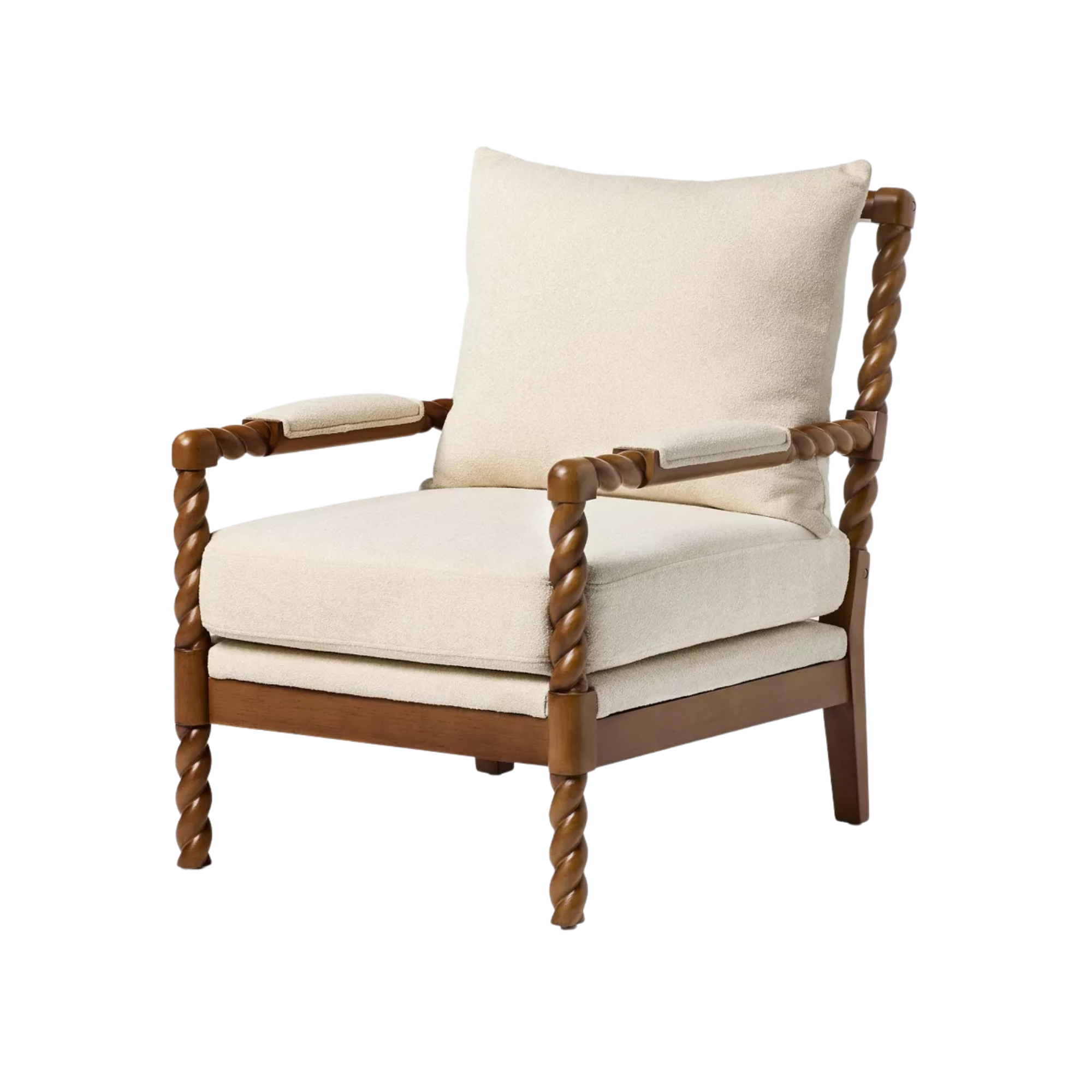 An accent chair with a twisted wooden frame and white pillows