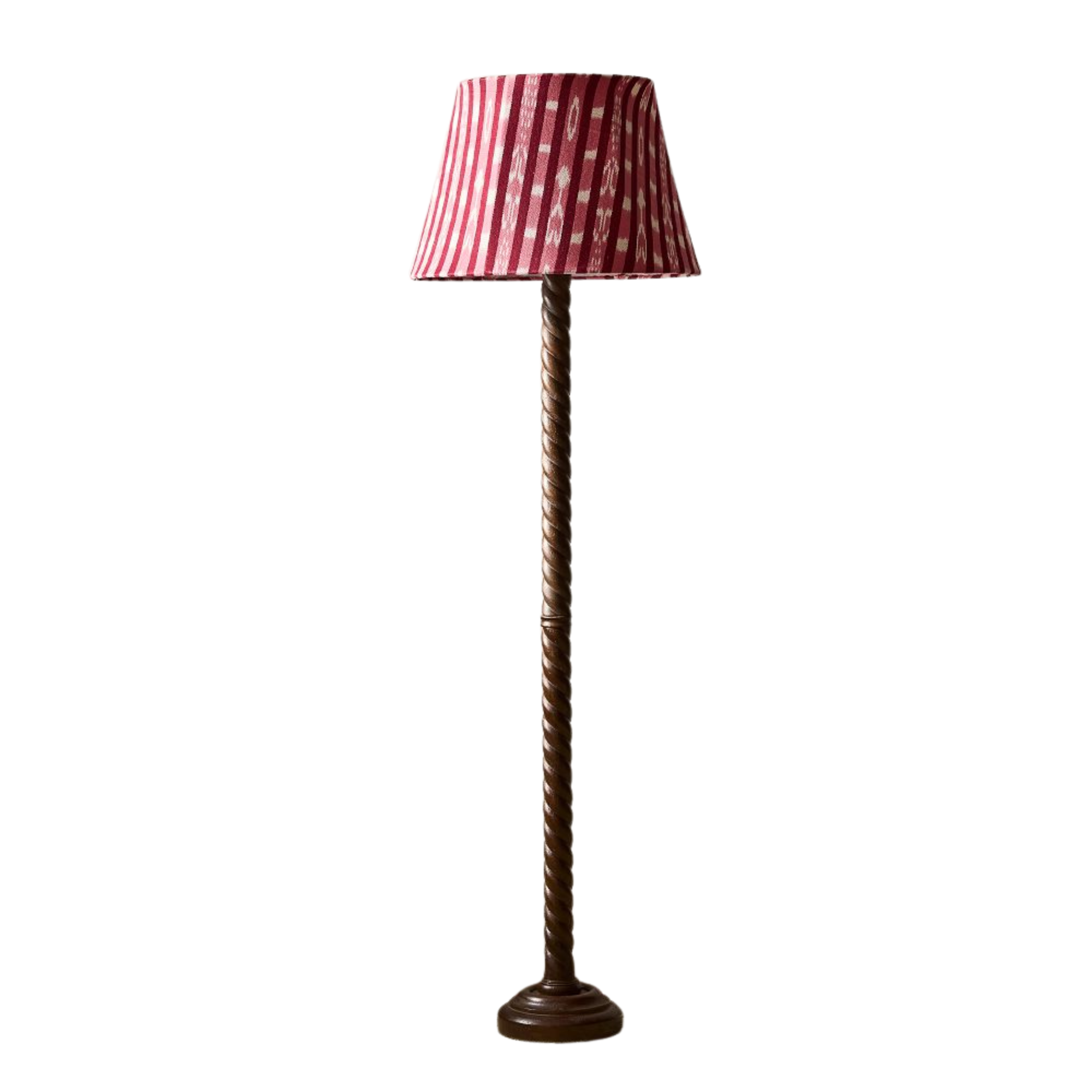 A floor lamp with a red color and a twisted wooden base