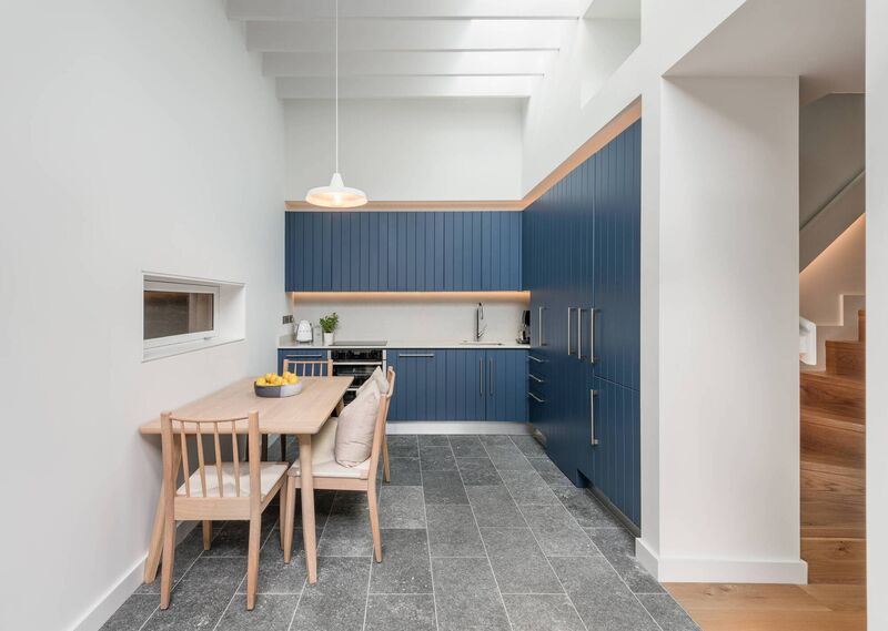     The accommodation on the renovated ground floor includes a kitchen as well as a new guest bath, a living room and a hillside cabinet, while the new extension offered a kitchen/dining room and a 