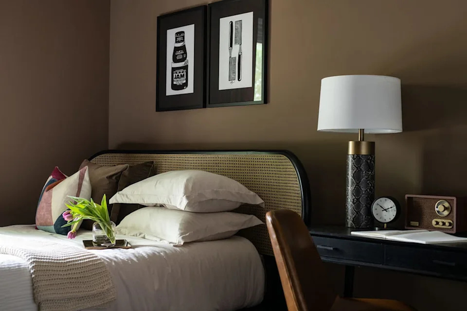 Bedroom with brown walls