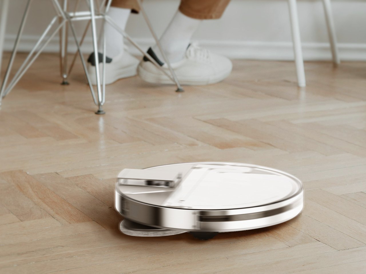 This nothing-inspired transparent robot vacuum concept serves as furniture as furniture