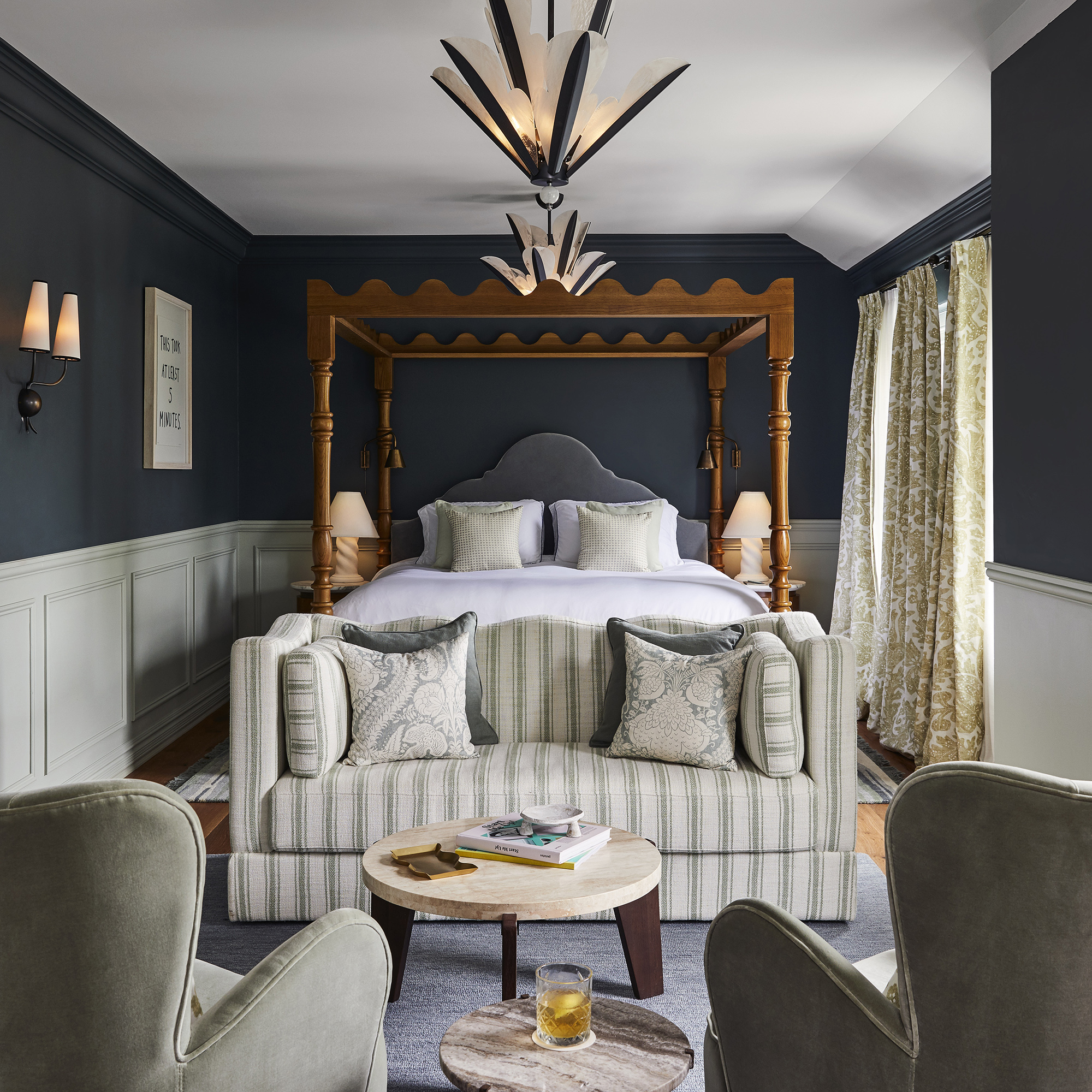 Dark bedroom with seating area
