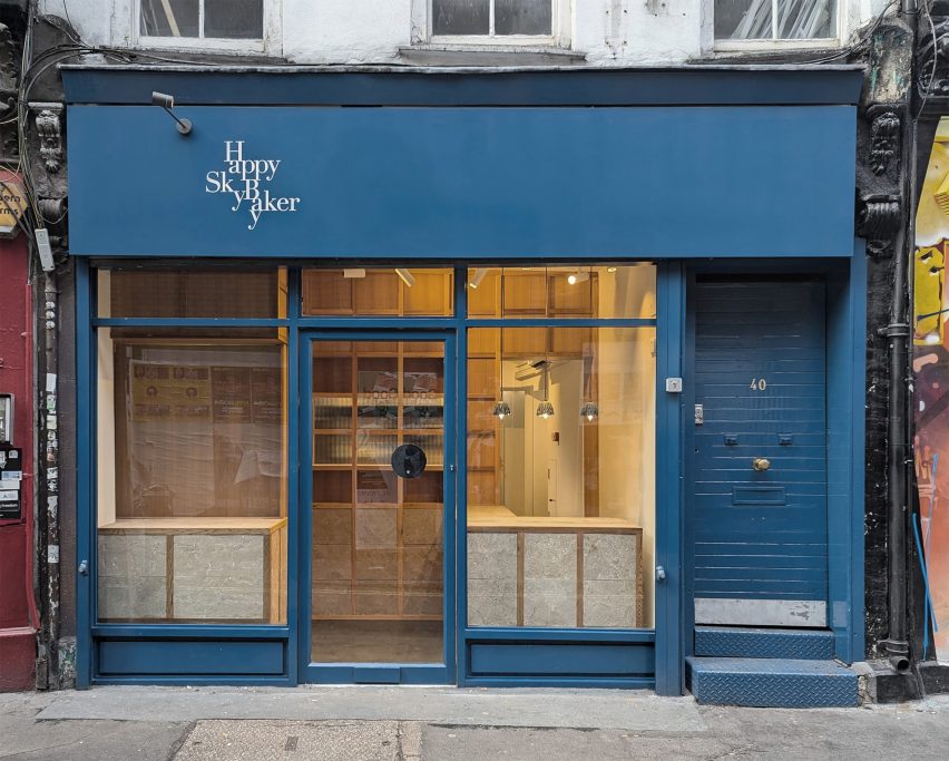 Photo of the Happy Sky Bakery, which shows a cobalt blue appearance with earthy panels from Cupsan