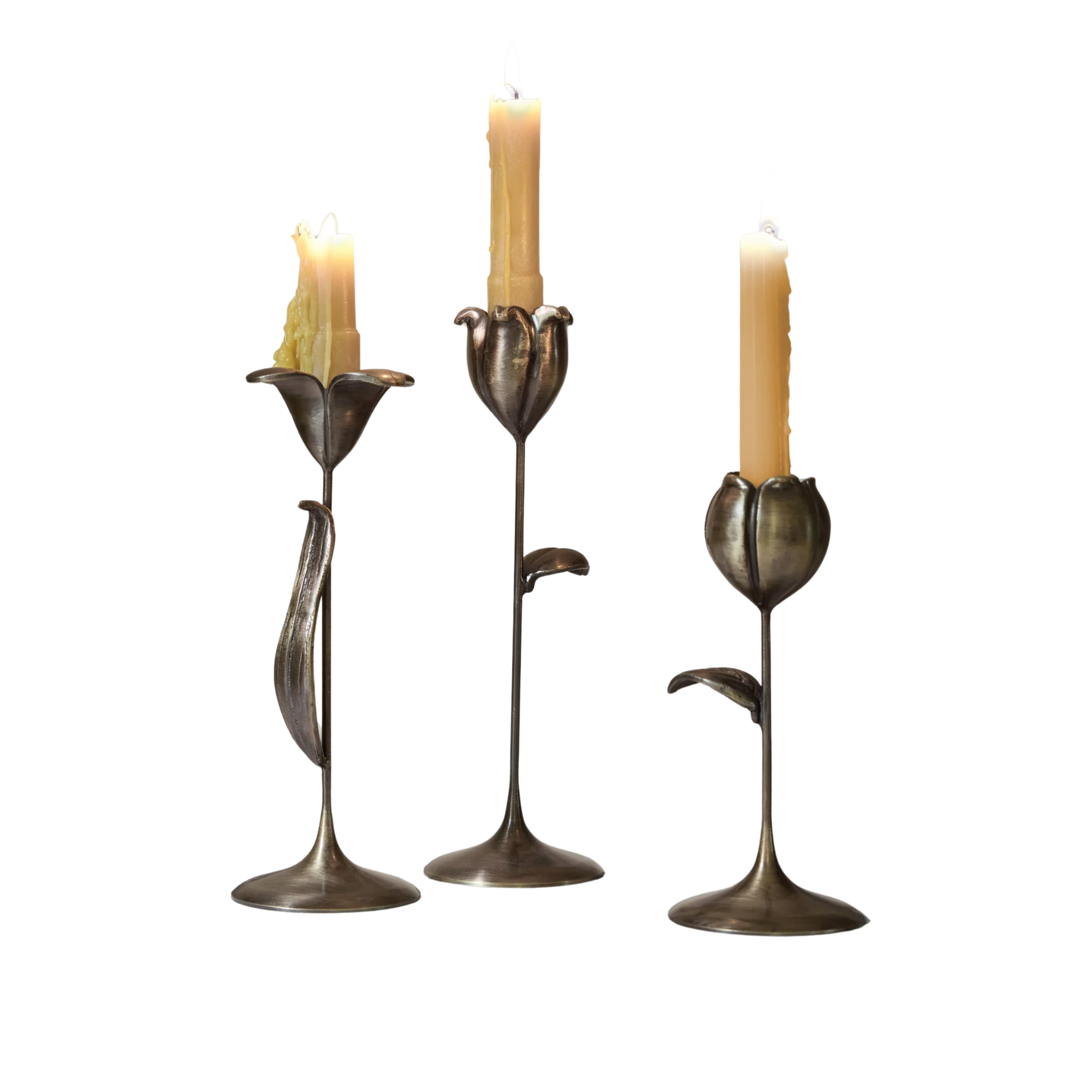 Set of three candle holders resembling flowers