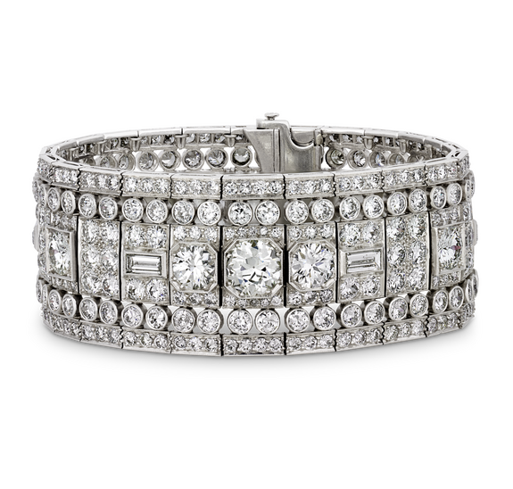 Art Deco diamond bracelet with an intricate geometric design and sparkling stones arranged in symmetrical patterns.