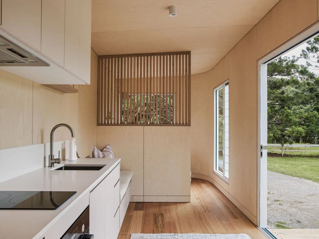 This $78,000 tiny house has curved walls and luxuries most homes never get