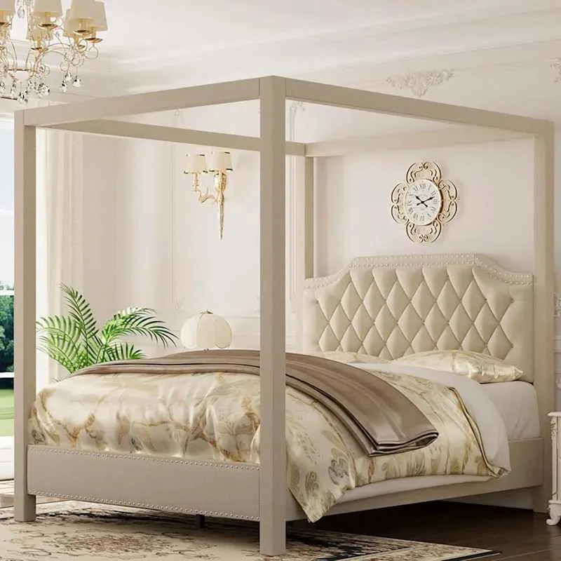 Luxury upholstered four poster bed from House of Hampton
