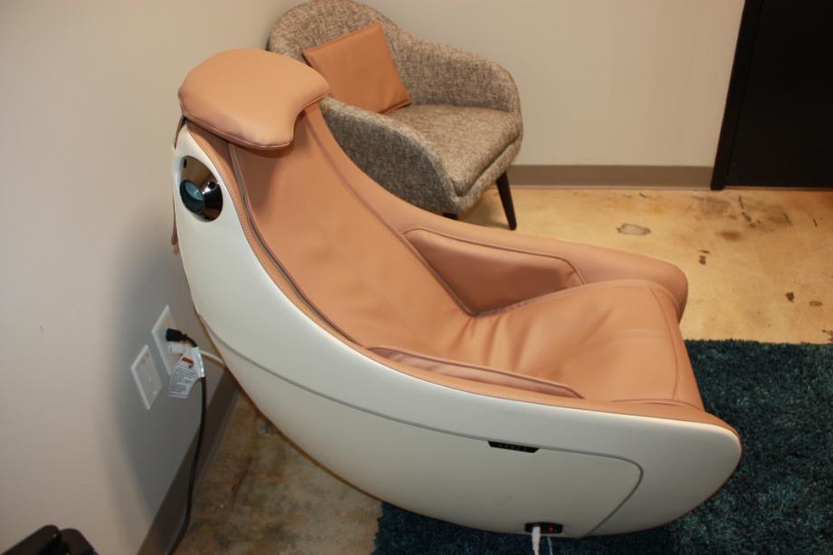 A side profile of the Synca Wellness CircC massage chair.