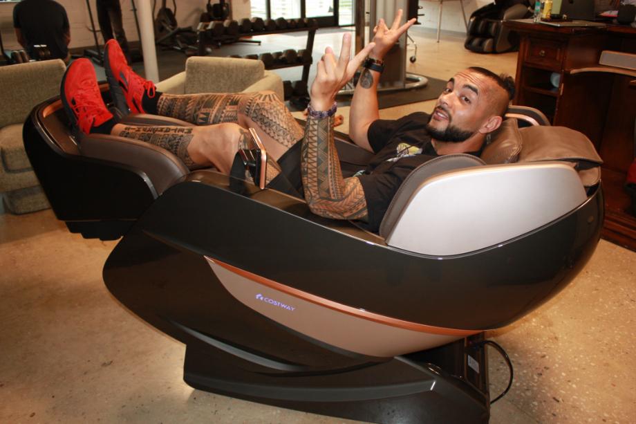 Stephen Sheehan, CPT, CNC leans back in a CostWay Therapy 22 chair