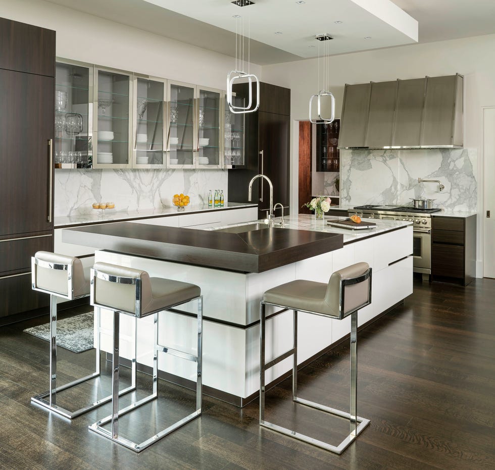 Modern kitchen with a simple design and functional elements.