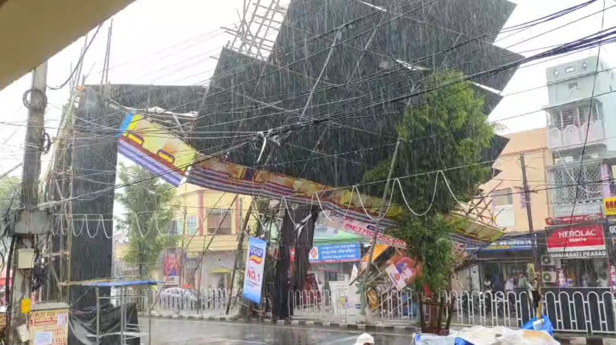 The huge Durga Puja Light Gate collapses on the Cuttack's College Square near Ravenshaw University
